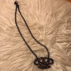 Heart brass knuckles necklace